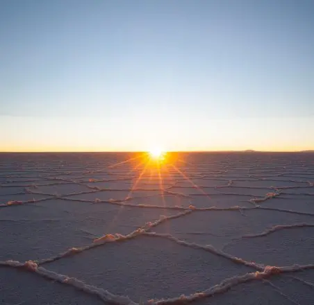 Sunrise over salt flats.